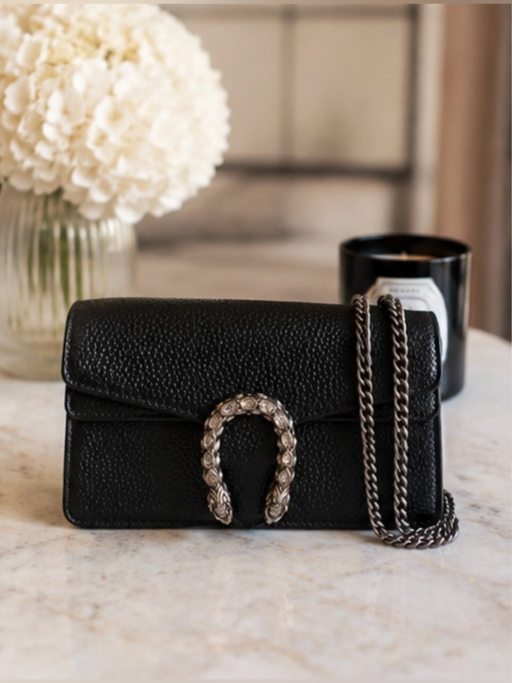 Black Faux Leather Mini Chain
Crossbody Bag with Crystal Horseshoe
Buckle